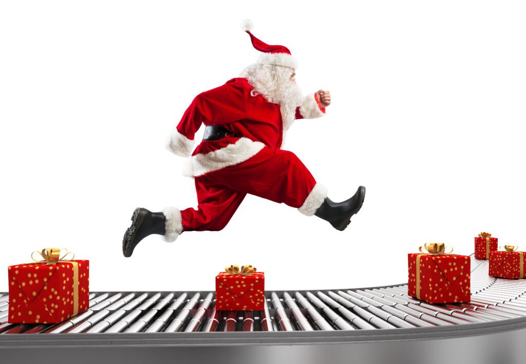 santa claus runs on the conveyor belt to arrange deliveries at christmas time 1024x709 - Preparamos tu Navidad